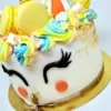 Gâteau avec décoration tête de licorne