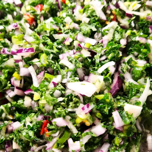 Image d'un mélange formant une sauce créole